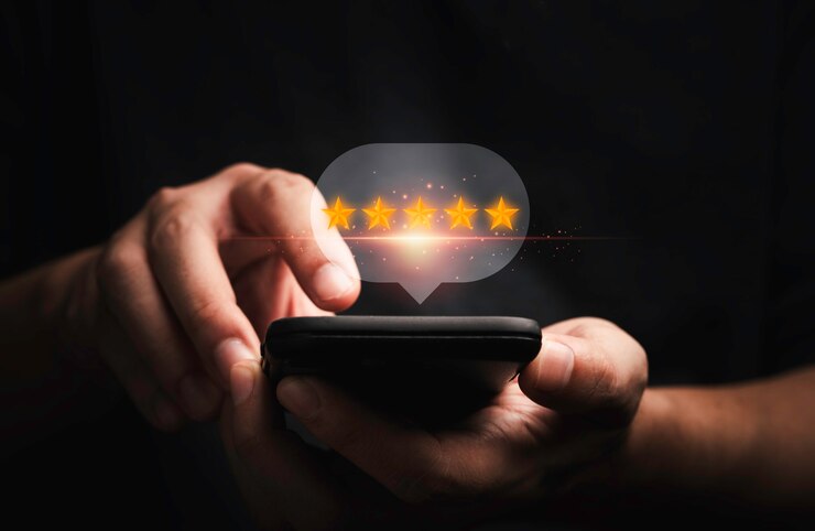 Photo businessman using smartphone to  the best customer client evaluation score for use product and service concept by 3d rendering.