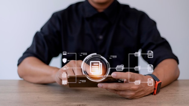 businessman using a smartphone to document management concept online documentation database and digital file storage system or software records keeping database technology file access doc sharing