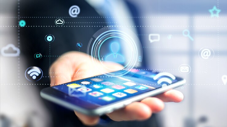 Photo businessman using a smartphone with a contact icon surrounding by app and social icon - 3d render 