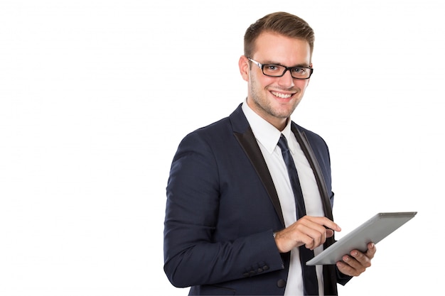 Businessman using a tablet pc, smiling