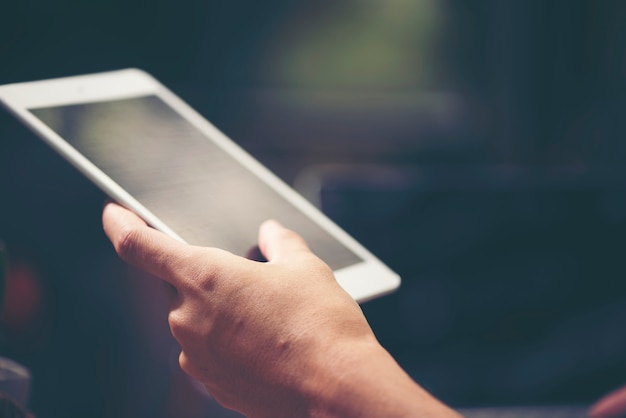 Businessman using tablet smartphone for working in the office