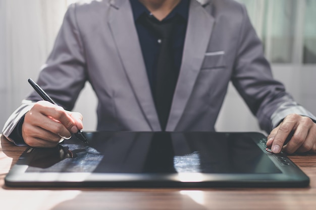 Businessman using tablet touch screen