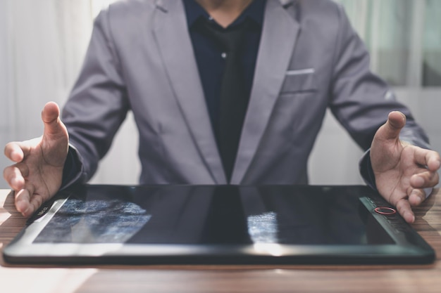 Businessman using tablet touch screen