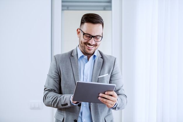 Businessman using tablet.