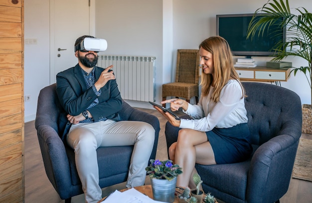 Businessman using virtual reality glasses