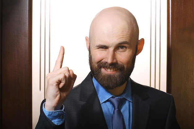 businessman victory gesture portrait