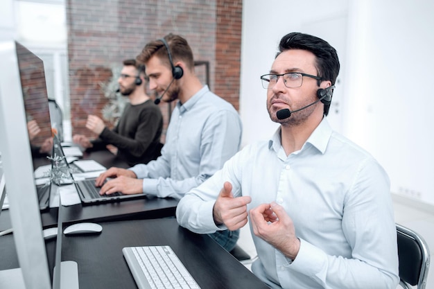 Businessman at a video session in the call center