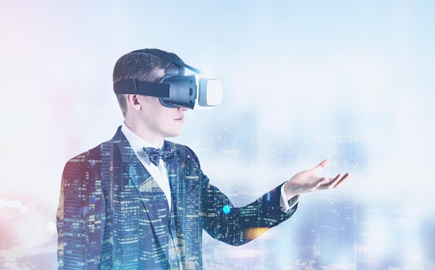 Businessman in VR glasses in a night city