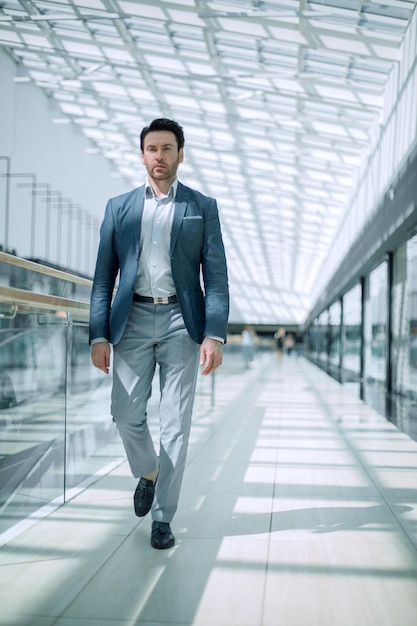 Businessman walking in the airport building