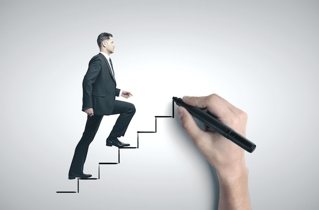 Photo businessman walking on drawing stairs