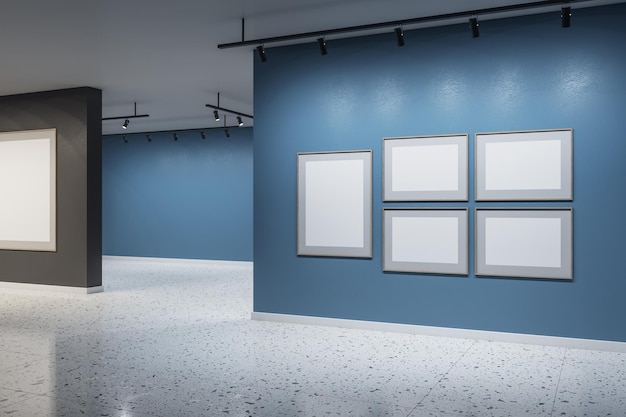 壁に空の白いモックアップポスターを付けた現代のコンクリート展示ホール内部を歩く実業家 芸術と博物館のコンセプト