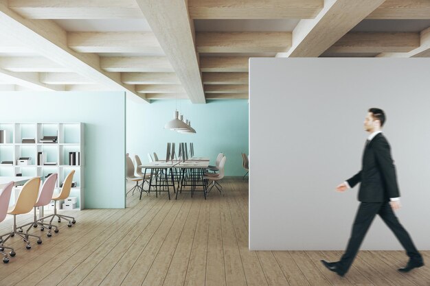 Photo businessman walking in office interior with computers