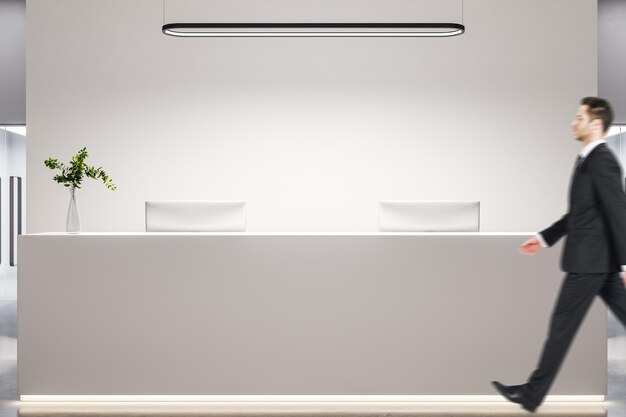Photo businessman walking in office lobby interior