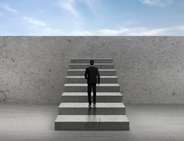 Businessman walking up stairs