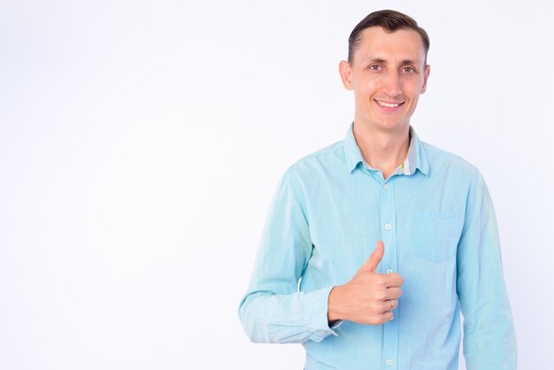  businessman wearing casual clothing isolated against white wall