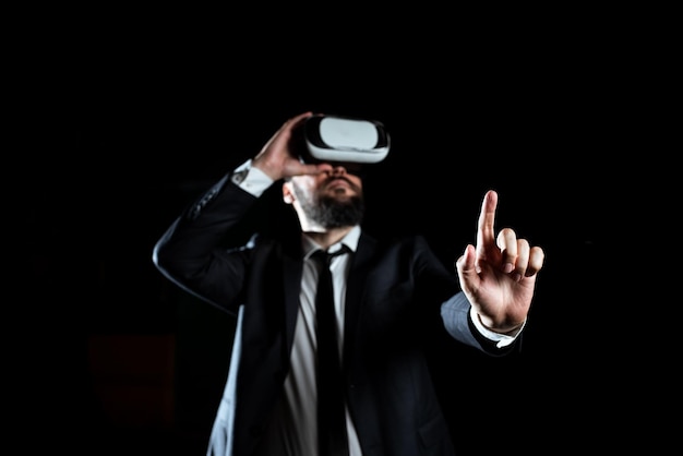 Businessman Wearing Virtual Reality Headset Gesturing And Taking Professional Training Through Simulator Man In Suit Presenting Modern Technology Of Innovative Learning