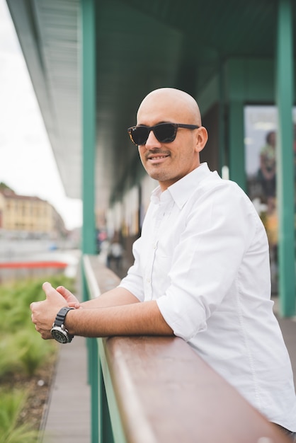 Businessman in white shirt with black sunglasses 