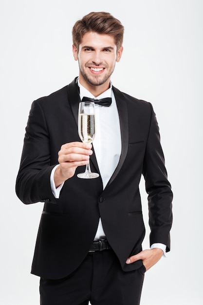 Businessman with champagne. in cool suit