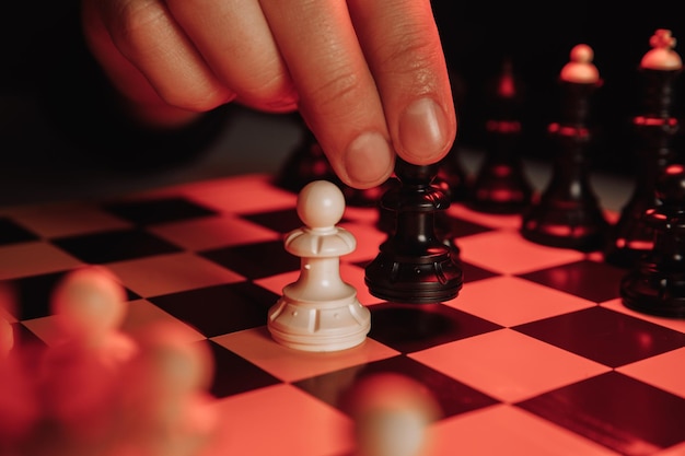 Businessman with chess board game. Plan stratgy concept.