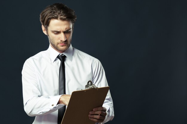 Businessman with clipboard