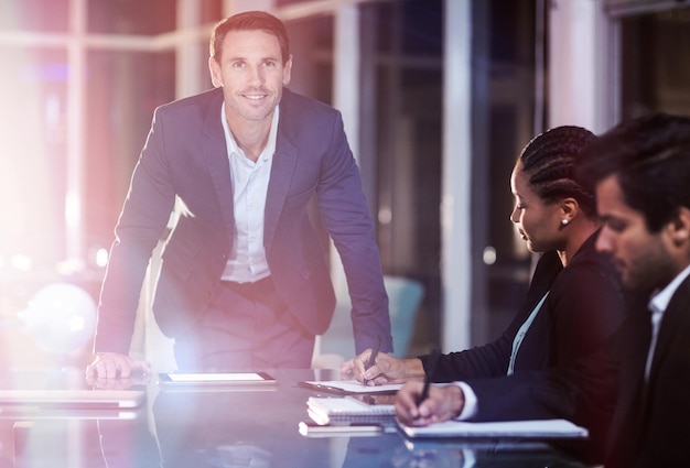 Businessman with coworkers in meeting