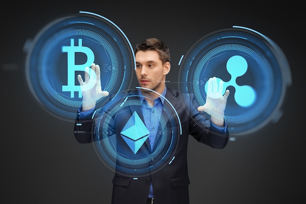 businessman with cryptocurrency holograms