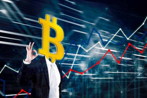 Businessman with head of bitcoin showing thumbs up