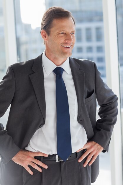 Businessman with his hands on hips