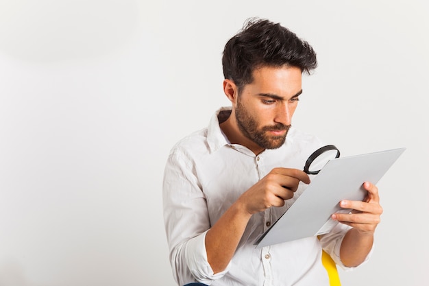 Businessman with loupe