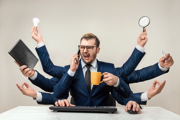 Photo businessman with many hands in a suit works simultaneously with several objects
