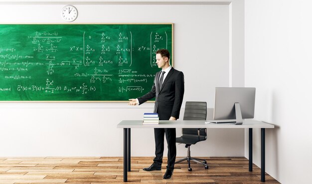 Businessman with mathematical formulas