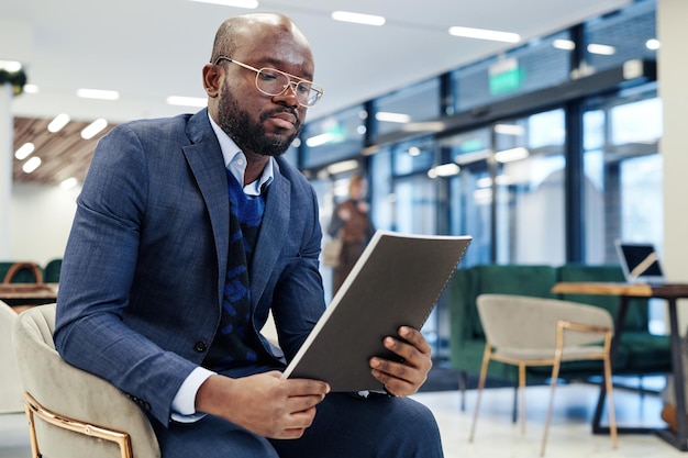 Businessman with report preparing for the meeting