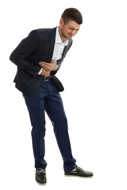 Businessman with stomach ache isolated on white background.