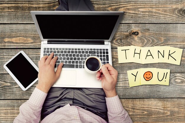 Businessman with  table pc,laptop and coffee