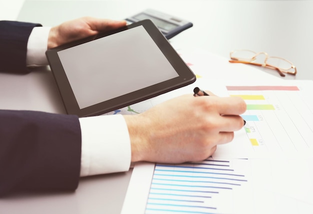 Businessman with tablet in office