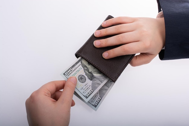 Businessman with US dollar banknotes money and a wallet