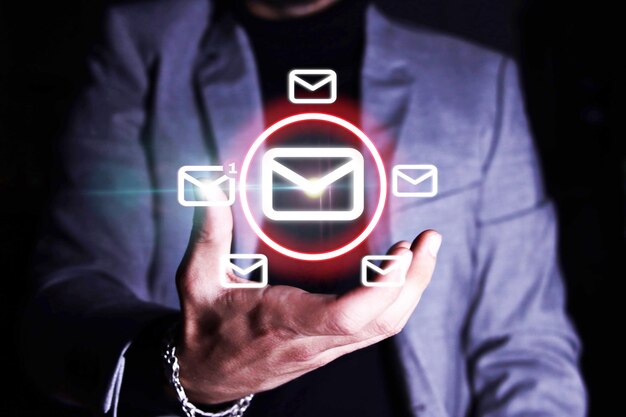 Businessman with virtual email notification icon