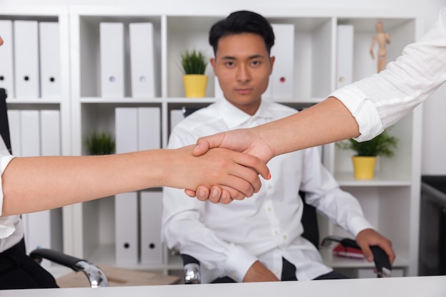 Businessman witnessing handshake