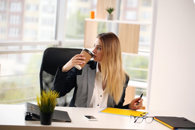 Businessman woman drinking coffee during workflow