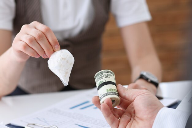 Businessman and woman exchanging a cutlet