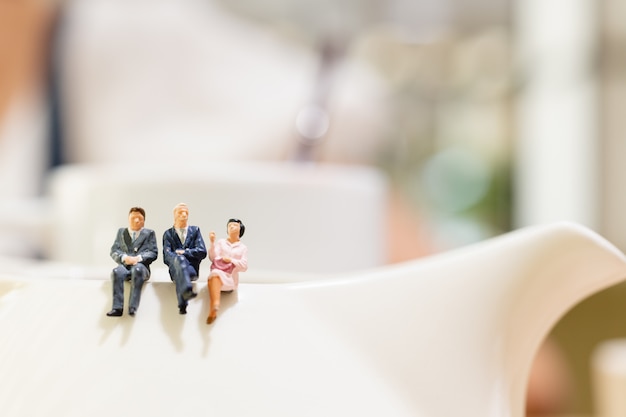 businessman and woman sitting on a cup of tea