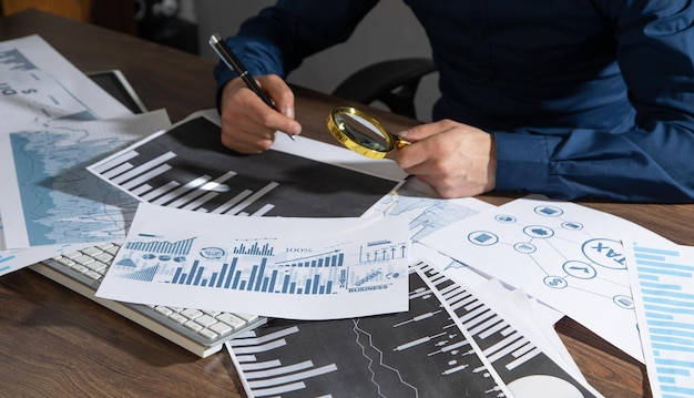 Businessman working in financial graphs