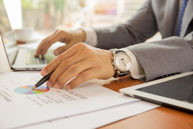 Businessman working on financial plan