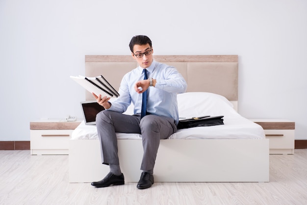 Businessman working in hotel room