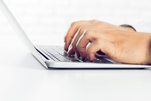 Businessman working on laptop. On the table