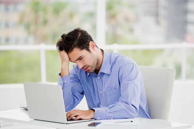 Businessman working on laptop