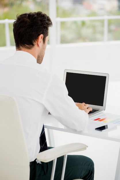 Businessman working on laptop