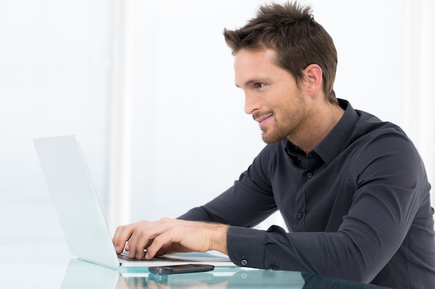 Businessman Working On Laptop