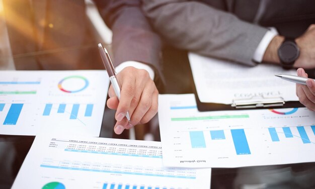 Businessman working at office desk he is building a growing