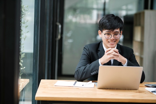 Businessman working at office using laptop